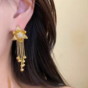 Elegant 18k gold plated flower earrings with zircon center and dangling bead tassels