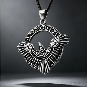 Close-up detail of a vintage punk style eagle pendant featuring intricate Celtic patterns