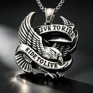 Detailed macro view of retro stainless steel eagle pendant with Live to Ride engraving.