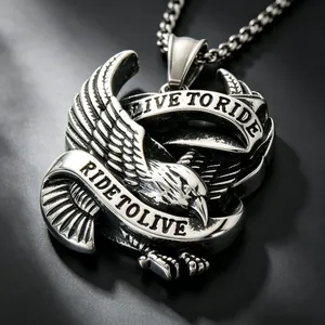 Detailed macro view of punk style stainless steel eagle pendant with engraved banners