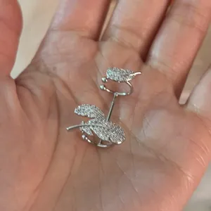 Elegant feather-shaped silver ear cuffs with pavé zircon stones for non-pierced ears