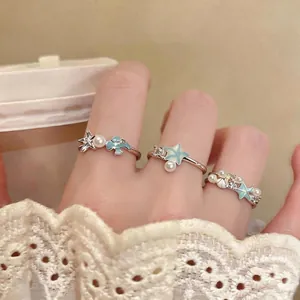 Fresh ocean-themed zircon open rings featuring starfish and shell designs for elegant women.