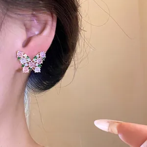 Elegant vintage butterfly stud earrings featuring sparkling colorful cubic zircon stones