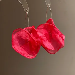 Vibrant red chiffon flower petal drop earrings featuring delicate fabric textures