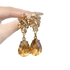 Vintage Baroque style earrings with large amber teardrop crystals and floral rhinestones