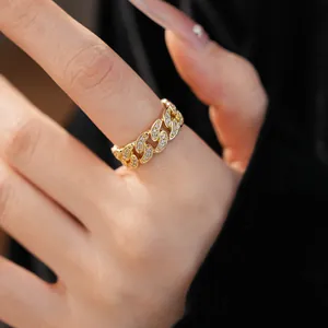 Close-up of 14k gold-plated hollow chain ring with shimmering cubic zirconia inlay.