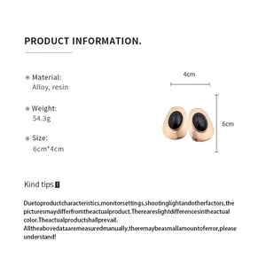 Detailed product specifications showing dimensions and material of oval earrings