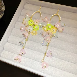 Elegant Mori style floral tassel drop earrings with rhinestones and pearls in gold