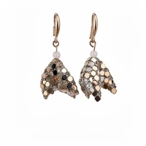 Elegant vintage geometric drop earrings featuring gold sequins and white pearl beads