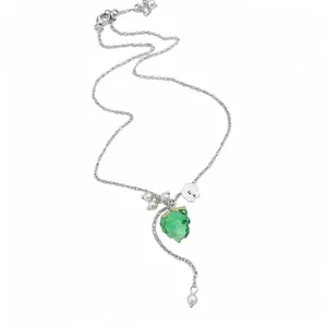 Elegant stainless steel necklace featuring a green resin grape pendant and pearls