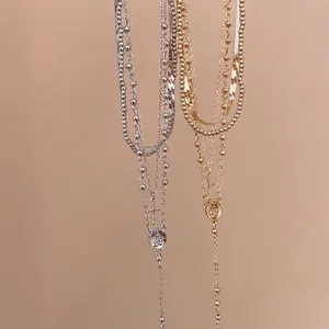 Vintage layered cross pendant necklace set with gold and silver bead chain finishes