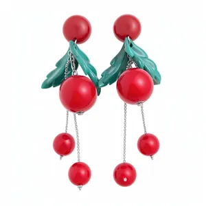 Vintage red cherry resin earrings with green leaves and stylish dangling tassel beads.