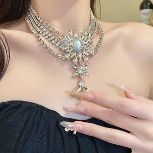 Detailed view of a luxury multi-layer rhinestone choker featuring a pearl flower pendant.