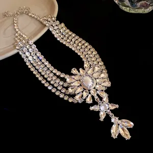 Exquisite detail of a multi-layered rhinestone necklace with floral drop pendant decor