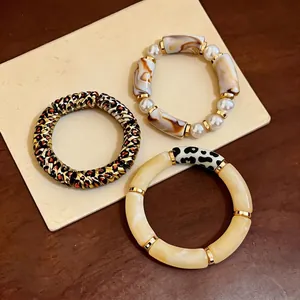 Vintage acrylic leopard print and marble texture bracelets with gold-tone accents