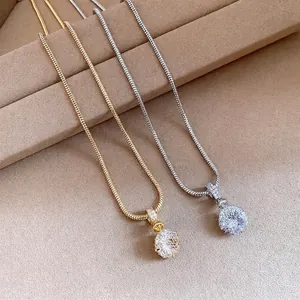 Exquisite round zircon pendant necklace with snake chain in gold and silver finishes