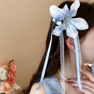 Elegant blue fabric flower hair clip with lace ribbons and sweet pearl details