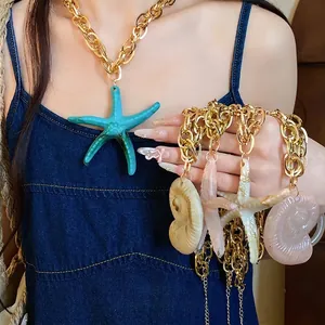 Vintage acrylic starfish and seashell pendant necklace for beach vacation style look.