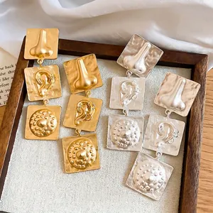 Retro exaggerated geometric earrings with unique nose and ear relief in gold and silver