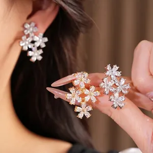 Elegant floral cubic zirconia clip-on earrings with 18K gold plating for non-pierced ears