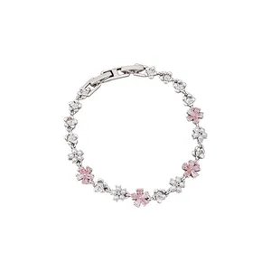 Elegant silver-toned flower bracelet featuring pink zircon crystals and white pearls