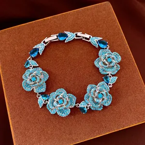 Vintage silver-tone bracelet with blue zircon flowers and teardrop stones