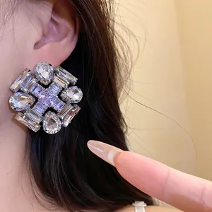 Sparkling silver needle stud earrings with geometric zircon clusters for a luxury look