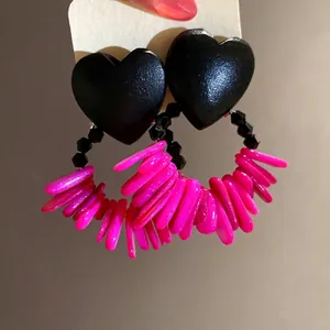 Vintage heart-shaped wood and hot pink shell tassel earrings with chic silver pins