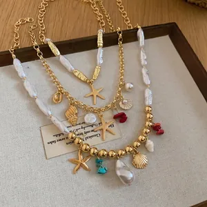 Exquisite layered beach necklaces with starfish pendants, shells, and Baroque pearls.