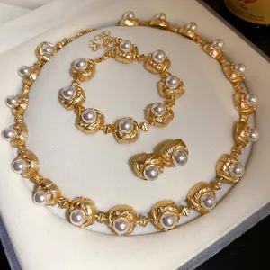 Luxury vintage gold pearl jewelry set including necklace bracelet and earrings