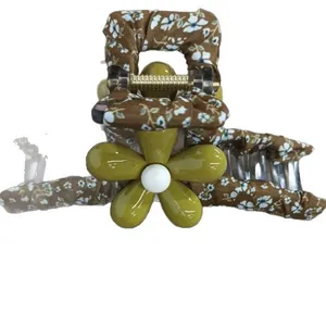 Large forest style floral hair claw clip with brown fabric and olive green flower