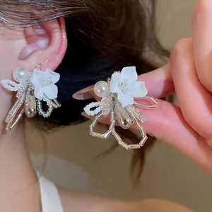 Elegant French style pearl and shell flower earrings with beaded accents for vacation
