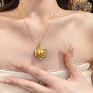 Close-up of a luxury vintage necklace with golden pearl and green zircon accents
