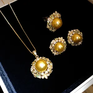 Vintage 18k gold plated jewelry set featuring golden pearls and zircon floral details