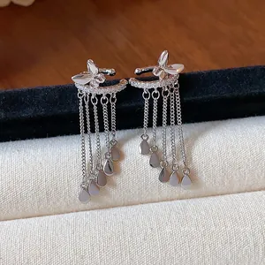 Elegant silver butterfly zircon ear cuff with hanging water drop tassel chains for women