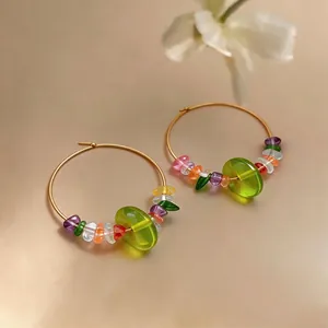 Fresh colorful resin stone beaded hoop earrings with green translucent center bead
