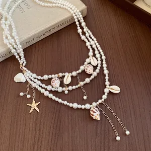 Luxury multi-strand pearl waist chain with ocean shell and starfish charms for beach