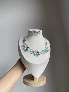 Elegant blue and green floral enamel necklace and matching stud earrings set for women