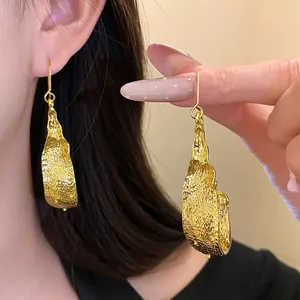 Stylish gold-colored textured U-shaped drop earrings for elegant jewelry collection