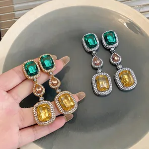 Detailed view of vintage multi-color gemstone drop earrings with S925 silver needles