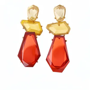 Bold geometric irregular resin dangling earrings with faceted stones in gold setting