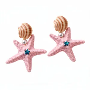Pink starfish and shell hair clips with pearl and blue crystal details for beach style