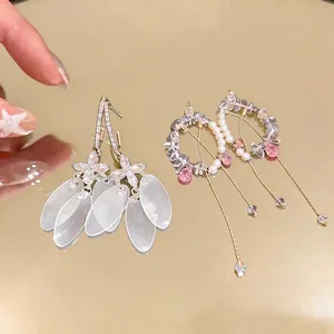 Elegant silver needle C-shaped shell and zircon earrings with long tassel drop details