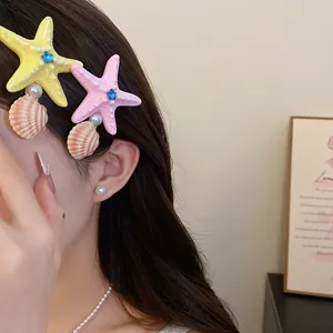 Colorful dopamine style starfish and shell hair clips perfect for summer beach vacations