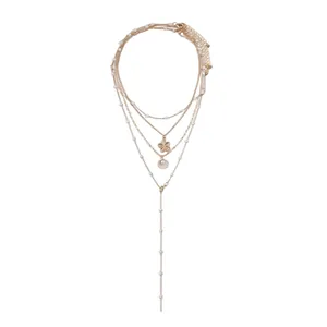 Elegant bohemian four-layer gold necklace set with pearl shell and flower pendants