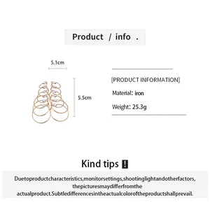 Detailed view of six-piece golden hoop earring set with dimensions and material info