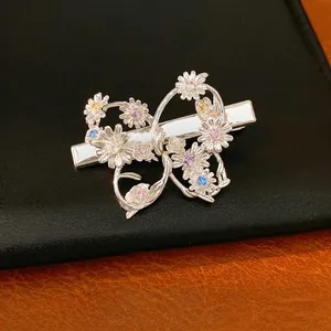 Elegant silver butterfly hair clip with colorful zircon flowers in a vintage style.