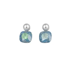 Elegant S925 silver needle earrings featuring grey pearls and blue cushion cut crystals
