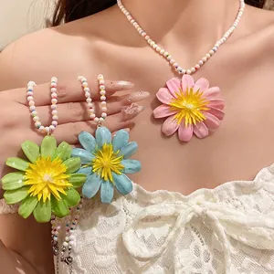 Bohemian style colorful beaded choker necklace with a large resin flower pendant for women