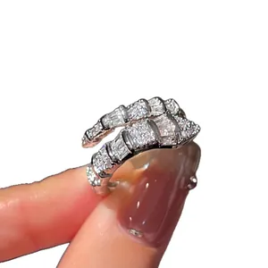 Silver snake-style open ring encrusted with sparkling baguette and round cubic zirconia.